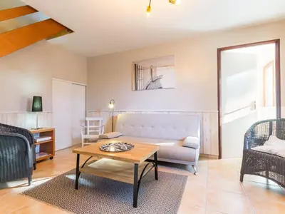 Coin salon dans l'établissement Ancien Bâtiment de Ferme Rénové entre Nantes et Pornic avec Jardin et Activités - FR-1-306-1028