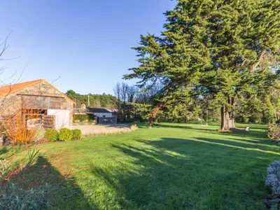 Jardin de l'établissement Gîte paisible à la campagne près de Pornic, jardin commun, wifi, idéal pour détente et loisirs - FR-1-306-1069