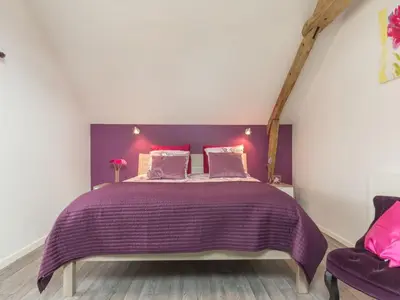 Un ou plusieurs lits dans un hébergement de l'établissement Gîte rénové avec jardin clos, proche Nantes, idéal famille, accessible PMR, wifi inclus - FR-1-306-1134