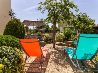 Jardin de l'établissement Maison de pêcheurs avec terrasse en bord de Loire, wifi, vélos et équipé bébé - FR-1-306-1177