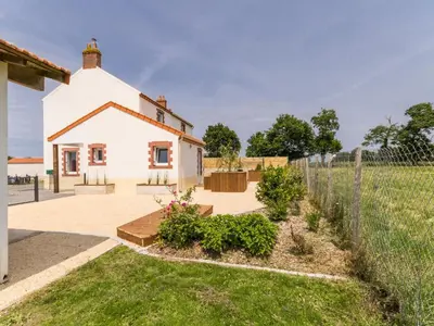 Jardin de l'établissement Charmante maison rénovée, au calme avec jardin, à 20 km de la mer et 35 km de Nantes - FR-1-306-1190