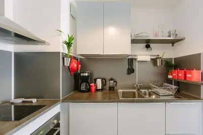 Cuisine ou kitchenette dans l'établissement L'Idéal - Cité des Congrès
