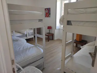 Un ou plusieurs lits dans un hébergement de l'établissement Château du Parc Soubise en Vendée
