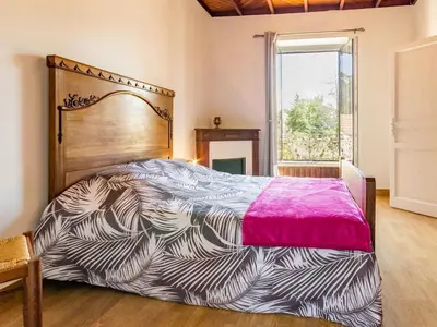 Un ou plusieurs lits dans un hébergement de l'établissement Maison calme 3 chambres proche plage avec jardin clos et parking à Saint-Brevin-les-Pins - FR-1-306-1065
