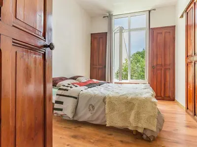 Un ou plusieurs lits dans un hébergement de l'établissement Maison calme 3 chambres proche plage avec jardin clos et parking à Saint-Brevin-les-Pins - FR-1-306-1065
