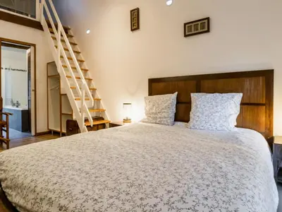Un ou plusieurs lits dans un hébergement de l'établissement Gîte cosy aux portes de Nantes, terrasse privée, vélos, Wifi, draps inclus - FR-1-306-824
