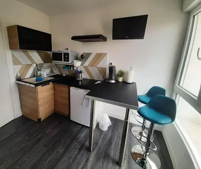 Cuisine ou kitchenette dans l'établissement Studette accès plage