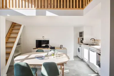 Cuisine ou kitchenette dans l'établissement Le Pommeraye - Coeur de ville