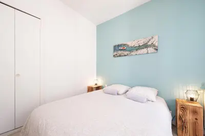 Un ou plusieurs lits dans un hébergement de l'établissement nid douillet 4places 2lits cœur de ville logement Hote-Zen wifi