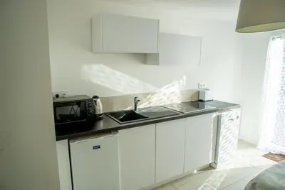 Cuisine ou kitchenette dans l'établissement Au clos du bonheur
