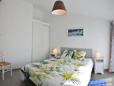 Un ou plusieurs lits dans un hébergement de l'établissement Gîte charmant avec spa et piscine au cœur du Marais Breton - FR-1-426-280