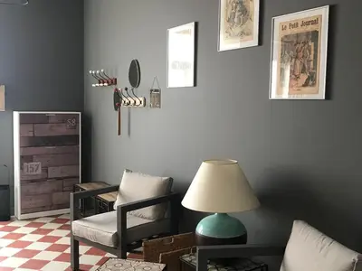 Coin salon dans l'établissement Maison de charme rénovée avec piscine, spa et proximité des plages vendéennes - FR-1-426-464