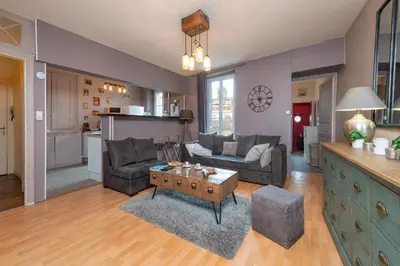 Coin salon dans l'établissement Appartement calme et cosy, Place du Ralliement
