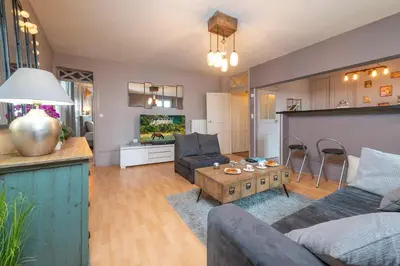 Cuisine ou kitchenette dans l'établissement Appartement calme et cosy, Place du Ralliement