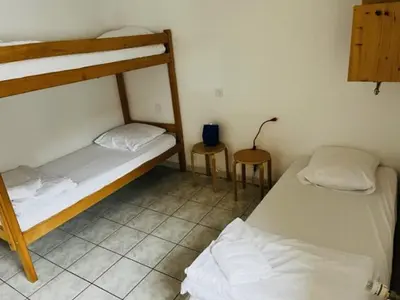 Un ou plusieurs lits dans un hébergement de l'établissement HOSTEL Les Bois Verts - Les Herbiers