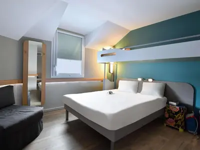 Un ou plusieurs lits dans un hébergement de l'établissement ibis budget Cholet Centre
