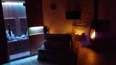 Coin salon dans l'établissement Echappée romantique
