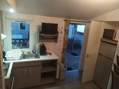Cuisine ou kitchenette dans l'établissement camping 4**** proche mer