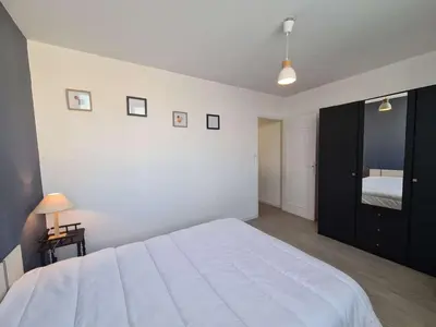 Un ou plusieurs lits dans un hébergement de l'établissement Appartement cosy 4 pers, proche plage et commerces, balcon, parking privé - Saint-Hilaire-de-Riez - FR-1-224C-149