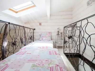 Un ou plusieurs lits dans un hébergement de l'établissement Les Chambres de la Forge des Collines