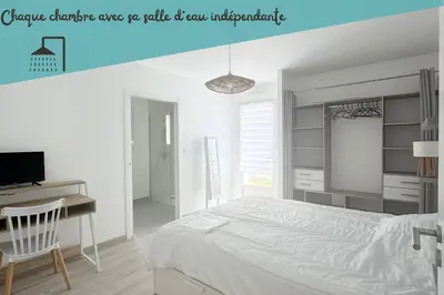 Un ou plusieurs lits dans un hébergement de l'établissement Belle maison de 140m2, proche centre ville