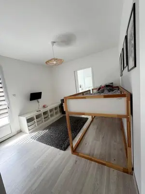 Télévision ou salle de divertissement dans l'établissement Belle maison de 140m2, proche centre ville