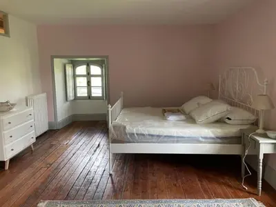 Un ou plusieurs lits dans un hébergement de l'établissement Gîte proche Puy duFou
