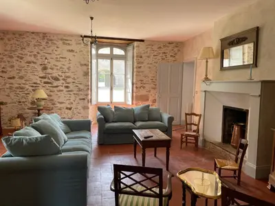 Coin salon dans l'établissement Gîte proche Puy duFou