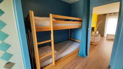 Un ou plusieurs lits dans un hébergement de l'établissement Studio familial 30m2 Les Goelands - grand balcon vue forêt