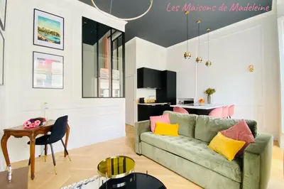 Télévision ou salle de divertissement dans l'établissement Nid urbain - L'Etoile du Sud - Hyper centre