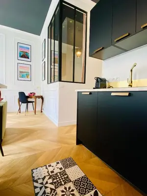 Cuisine ou kitchenette dans l'établissement Nid urbain - L'Etoile du Sud - Hyper centre
