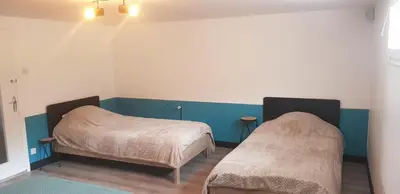 Un ou plusieurs lits dans un hébergement de l'établissement Puy du Fou Maison 12 personnes 4mn du Grand Parc