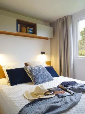 Un ou plusieurs lits dans un hébergement de l'établissement Mobil-home Dan Dom
