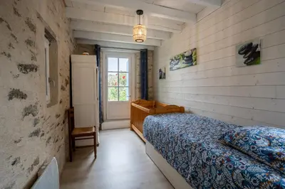 Un ou plusieurs lits dans un hébergement de l'établissement maison tartifume