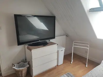 Télévision ou salle de divertissement dans l'établissement Chambre chez l'habitant