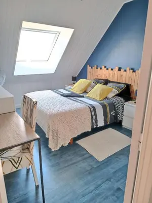 Un ou plusieurs lits dans un hébergement de l'établissement Chambre chez l'habitant