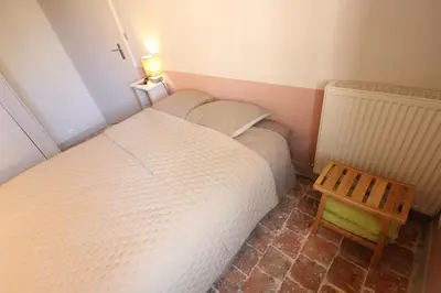 Un ou plusieurs lits dans un hébergement de l'établissement Maison du Lys en Layon