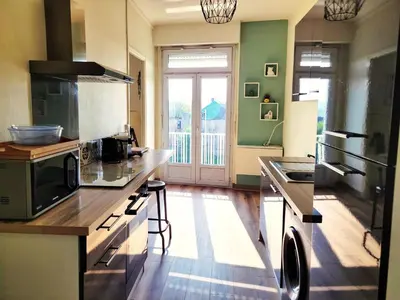 Cuisine ou kitchenette dans l'établissement St Jak Appartement