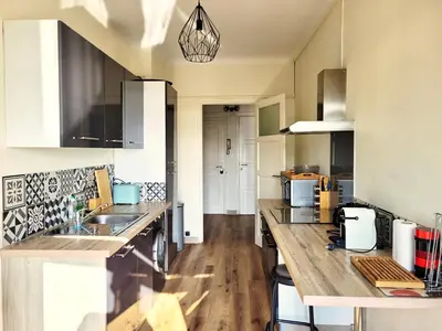 Cuisine ou kitchenette dans l'établissement St Jak Appartement