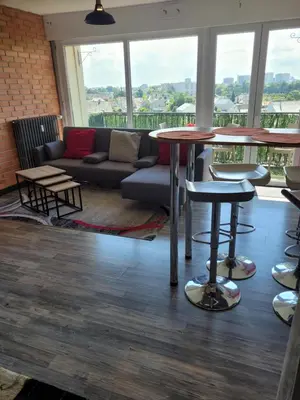 Coin salon dans l'établissement Grand T5 pour 7 Pers