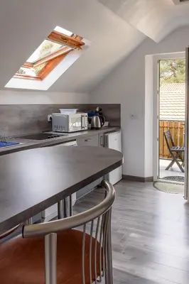 Cuisine ou kitchenette dans l'établissement Villa de la plage
