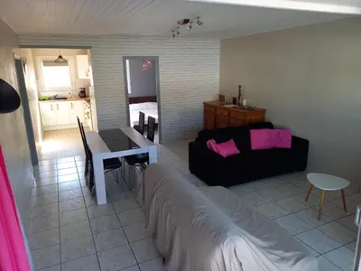 Un ou plusieurs lits dans un hébergement de l'établissement Appartement spacieux et lumineux Secteur Petit Marché à 5 min a pied de la plage