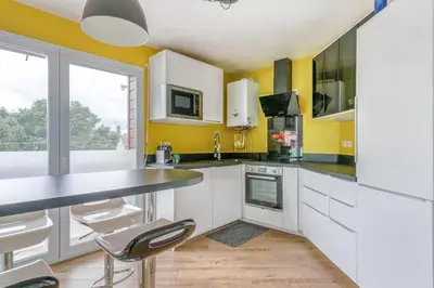 Cuisine ou kitchenette dans l'établissement NYMPHÉA - Duplex Hauts Pavés