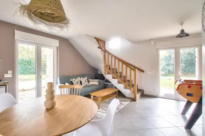 Coin salon dans l'établissement NOCNOC - Gîte du Vieux Pressoir, piscine chauffée et couverte