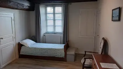 Un ou plusieurs lits dans un hébergement de l'établissement Le Logis de Stofflet