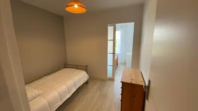 Un ou plusieurs lits dans un hébergement de l'établissement Appartement 3 chambres, panoramique vue océan