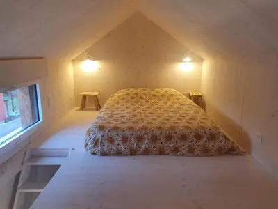 Un ou plusieurs lits dans un hébergement de l'établissement TINY HOUSE Cosy 1 - Angers Green Lodge