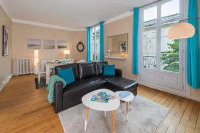 Coin salon dans l'établissement Appartement Coeur de Ville rue Saint-Laud