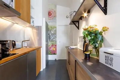 Cuisine ou kitchenette dans l'établissement Portus