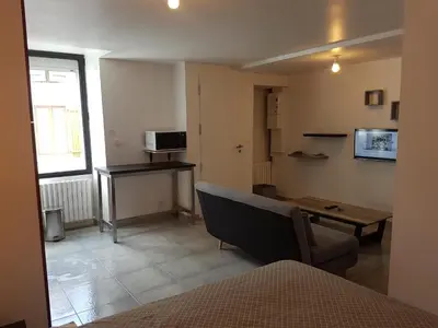 Cuisine ou kitchenette dans l'établissement Studio 30 m2 toutlemonde